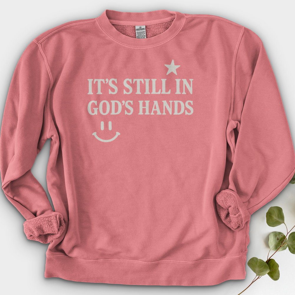 It's still in God's Hand Crewneck