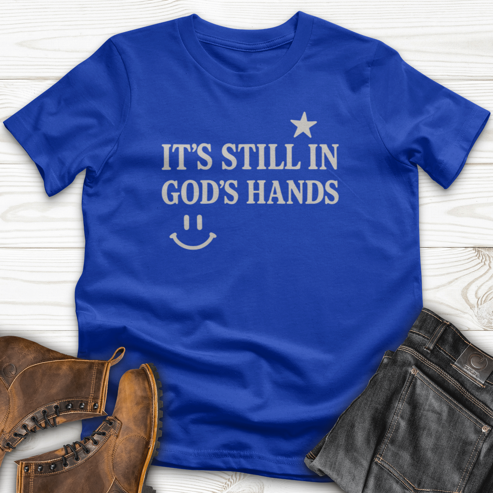 It's still in God's Hand T-Shirt